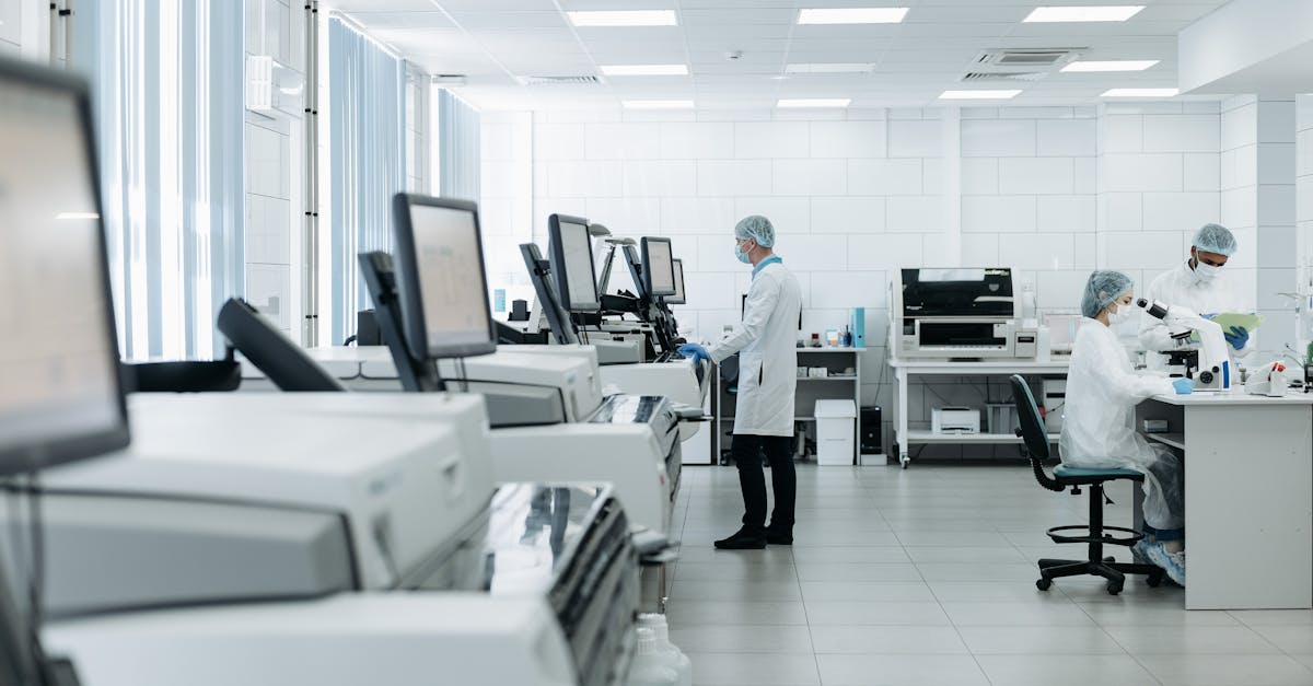 Healthcare professional using advanced technology to analyze patient data in a clinic.