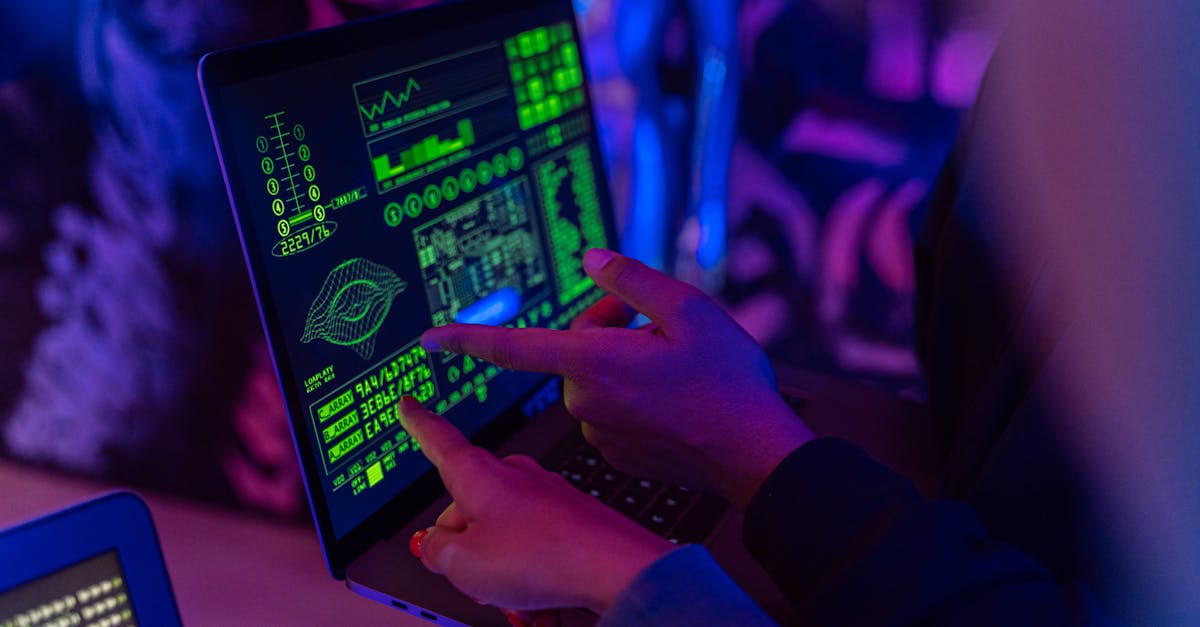 Cybersecurity expert analyzing data on multiple screens in a modern office.
